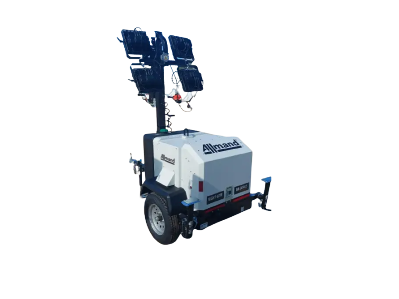 A light tower is sitting on top of a trailer on a white background.