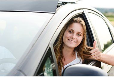 Woman in car — Auto Tags, Title Transfers and More in Doylestown, PA