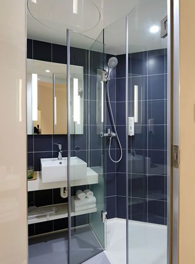 Atlanta apartment with frameless glass shower door and enclosure