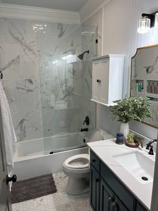 Superior Shower Doors Atlanta GA - image of frameless shower doors in master bathroom