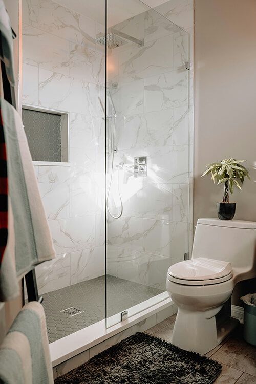 Frameless shower doors-small Atlanta bathroom