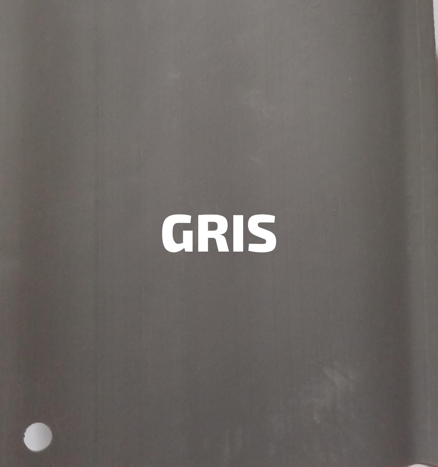 Un primer plano de una hoja de papel con la palabra gris escrita