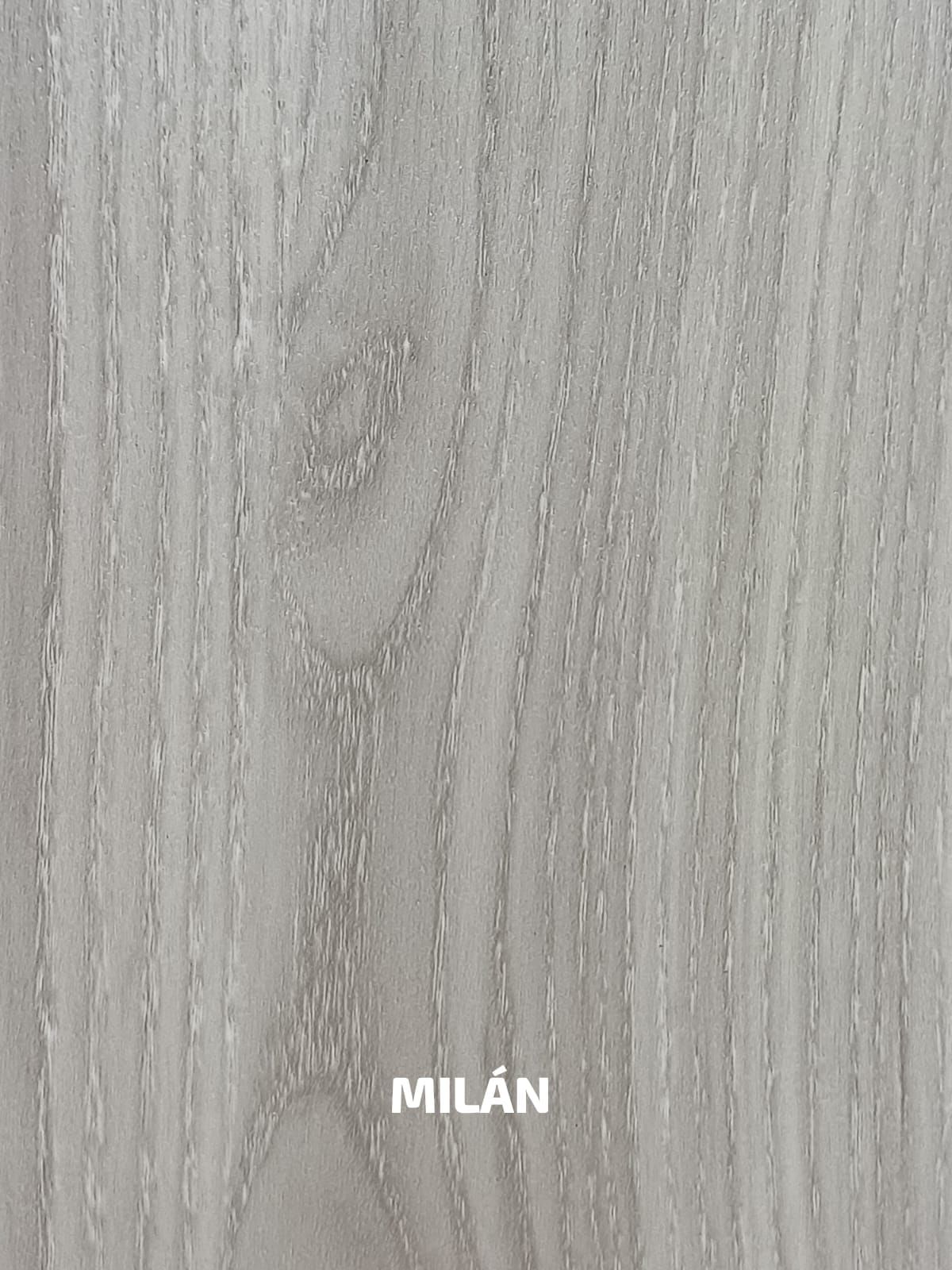 Un primer plano de un trozo de madera con la palabra milán escrita