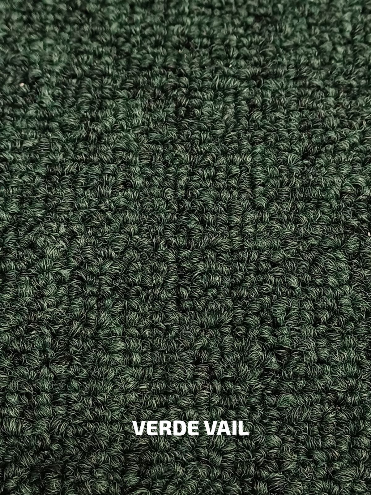 Un primer plano de una textura de alfombra verde.
