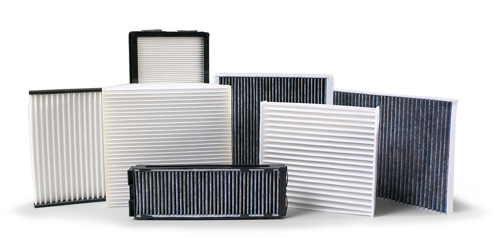 Various air filters on white background.