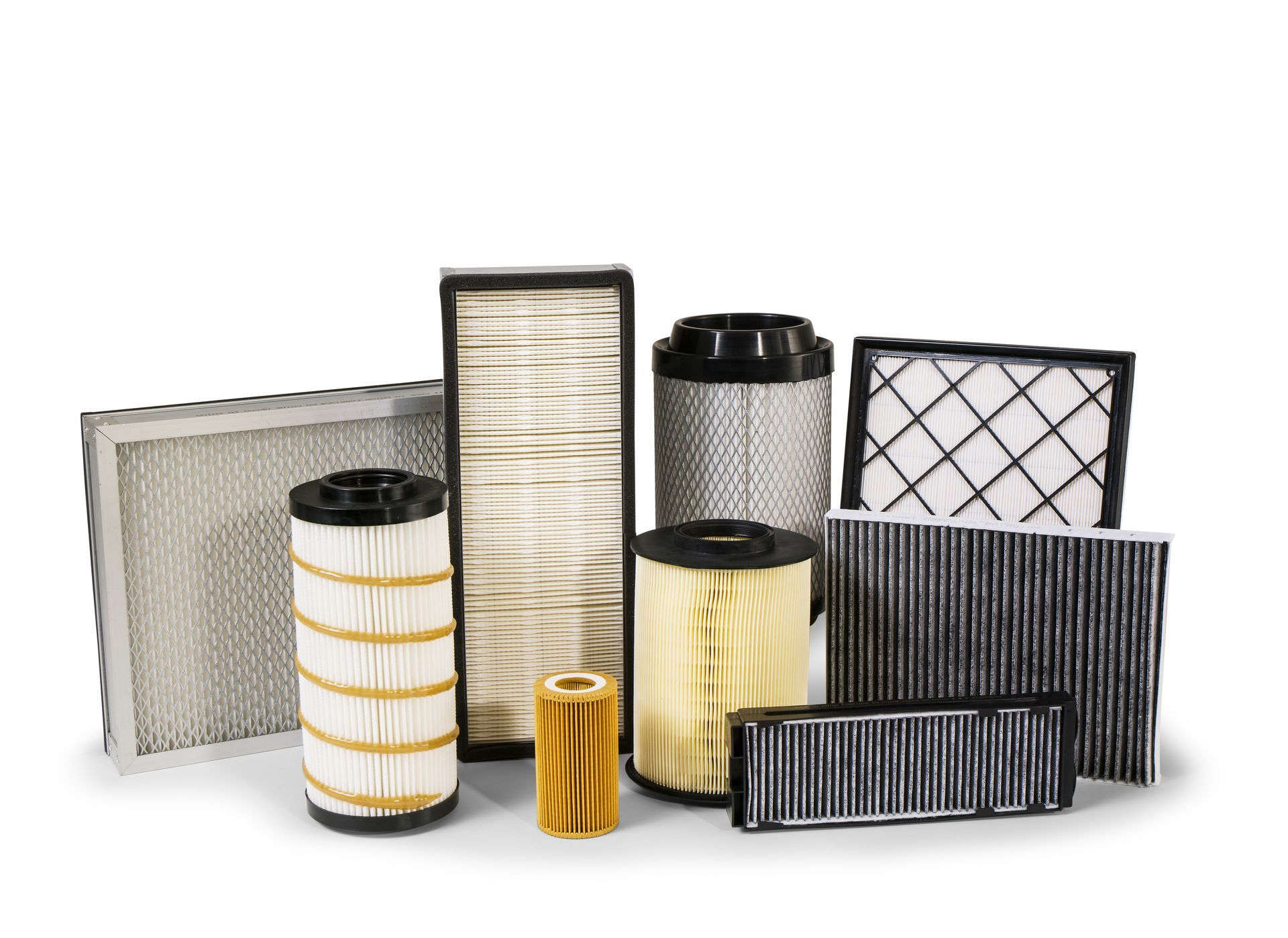 Various air filters of different shapes and sizes, mostly in white and black.