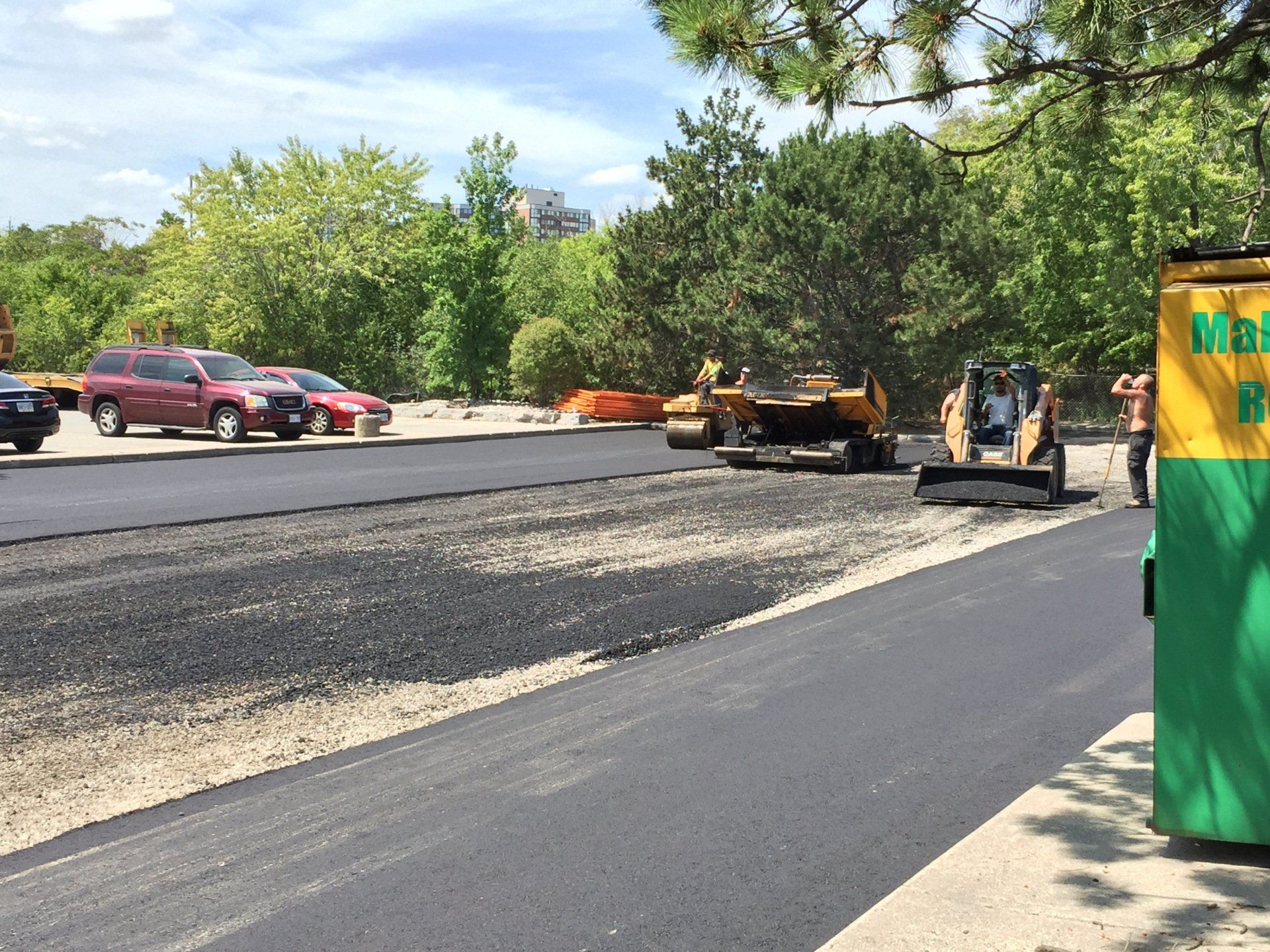 A green and yellow container with the word nba on it