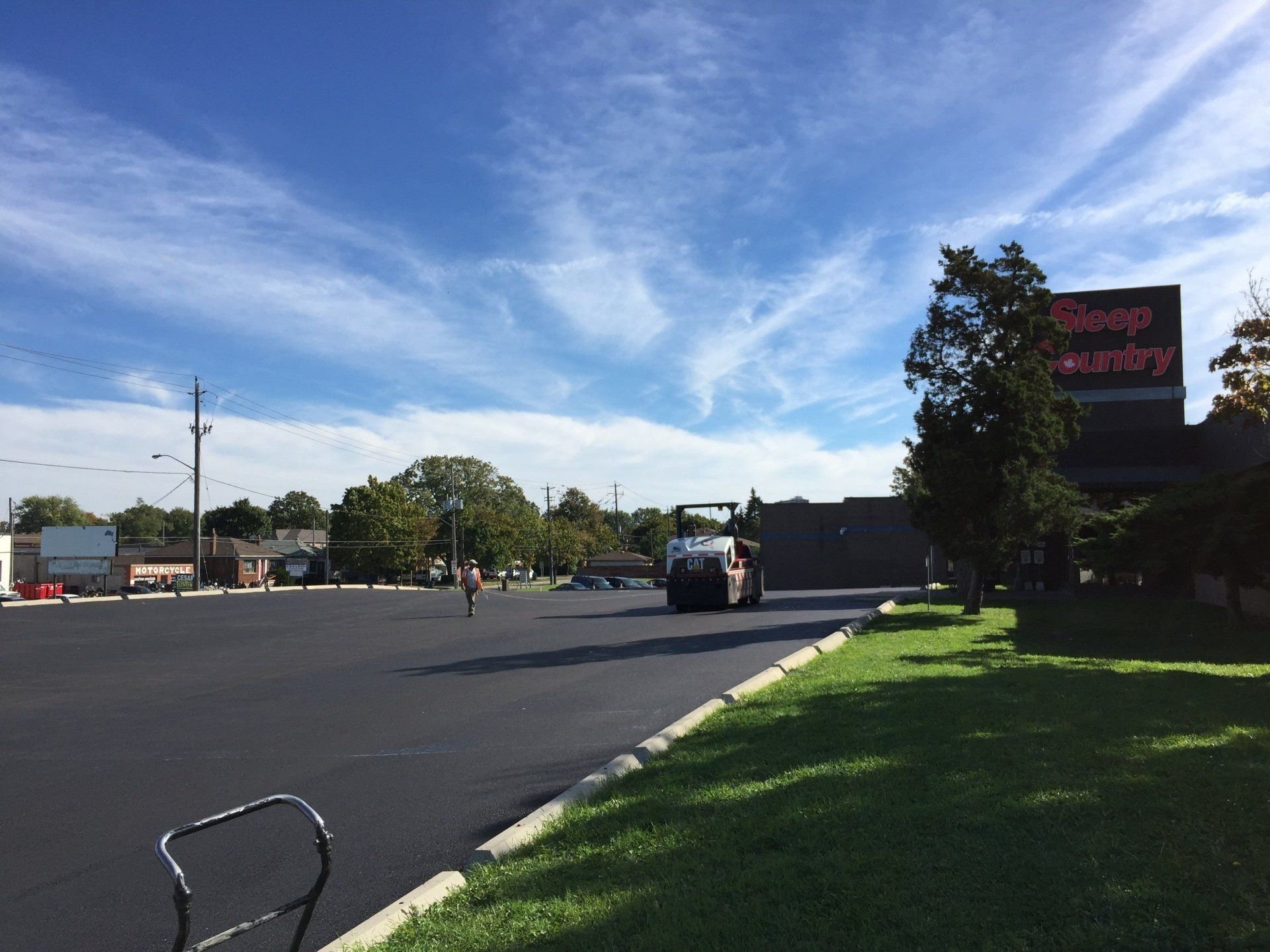 A parking lot with a sign that says stop and shop