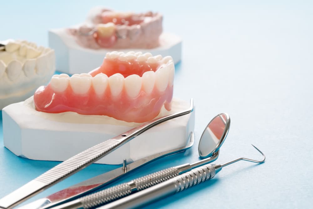 Full Denture And Other Equipment On Table - Dentures In Albury, NSW