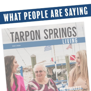 Tarpon Springs city magazine cover featuring three people, one speaking into a microphone in a street scene