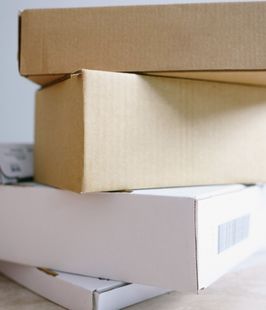 Three cardboard boxes are stacked on top of each other