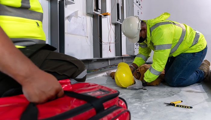 An electrician on a roof expertly installing a security camera to enhance home security.