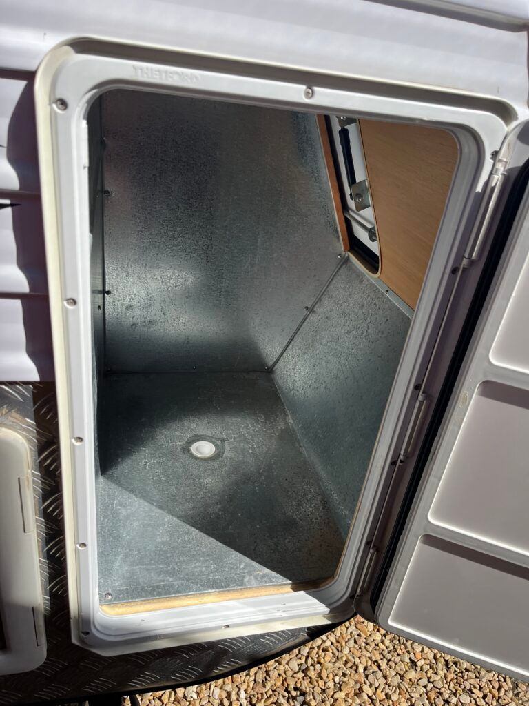The Door Of A Camper Is Open And Empty — Perkins Caravans in Ballina, NSW