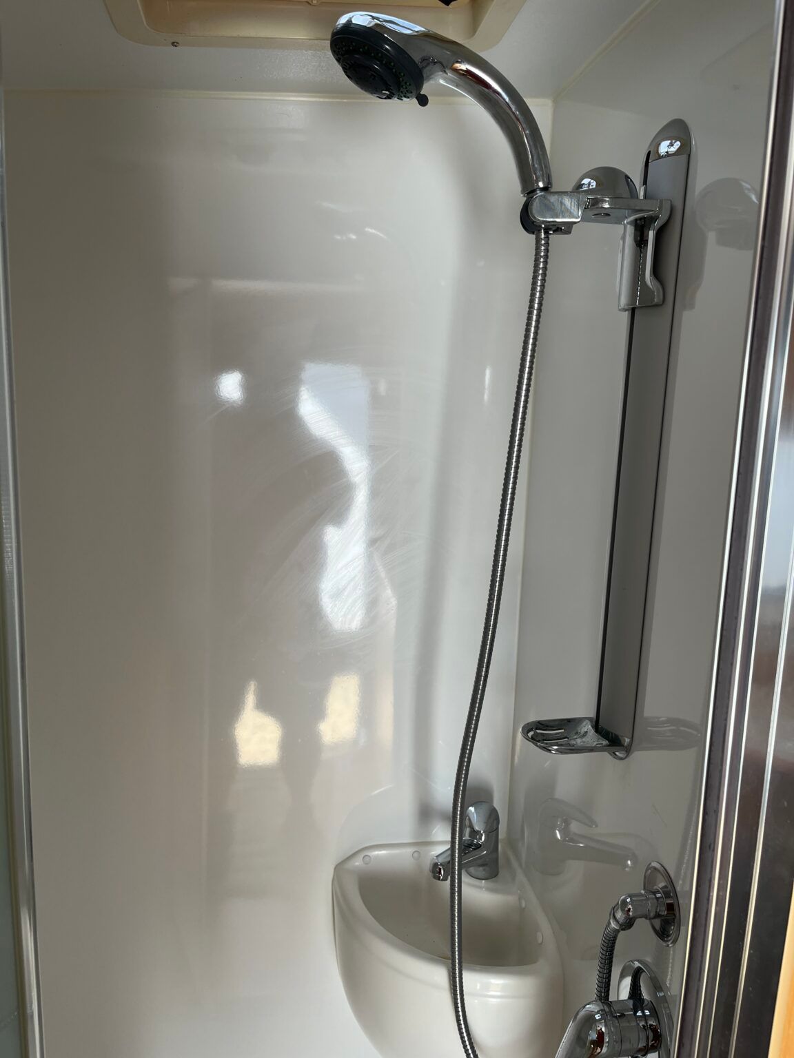 A Shower With A Sink And A Shower Head — Perkins Caravans in Ballina, NSW