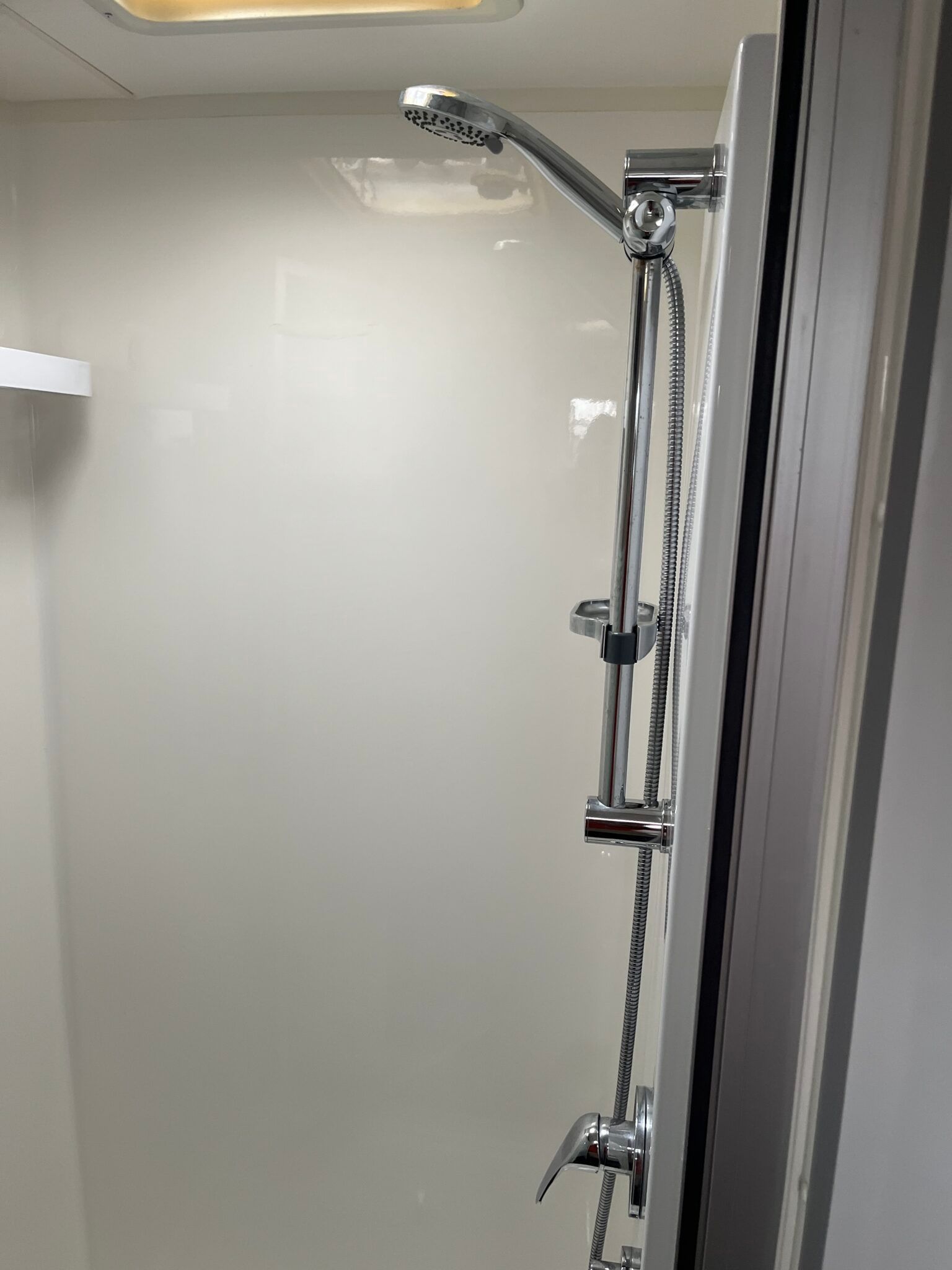 A Close Up Of A Shower Head In A Bathroom — Perkins Caravans in Ballina, NSW