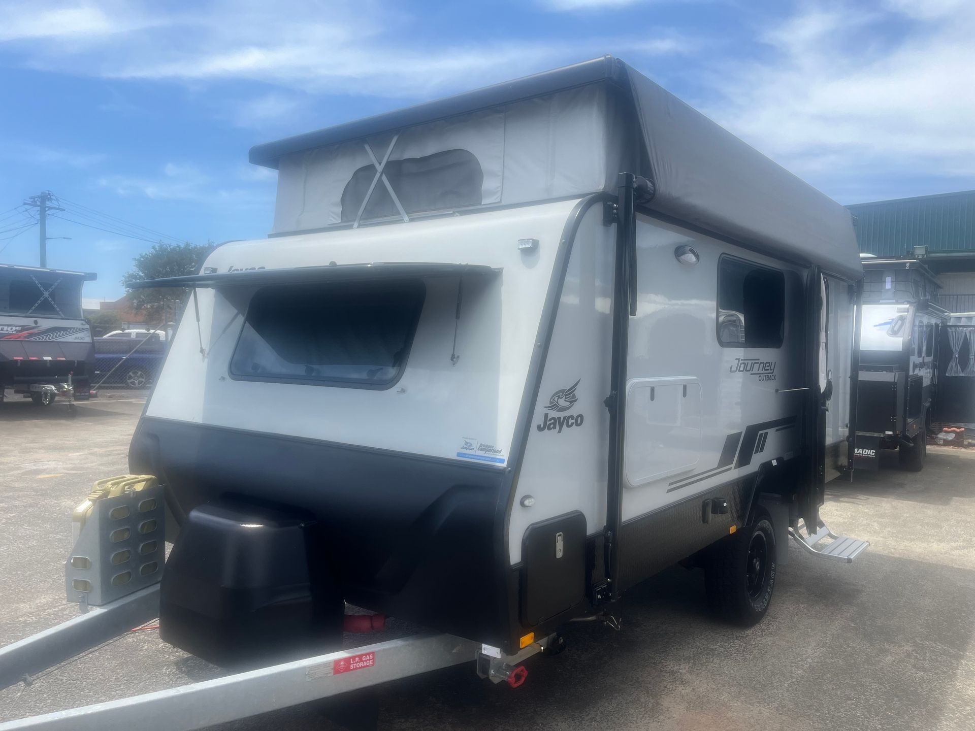 A Used Pop Top Caravan On Display In A Yard - Perkins Caravans Ballina