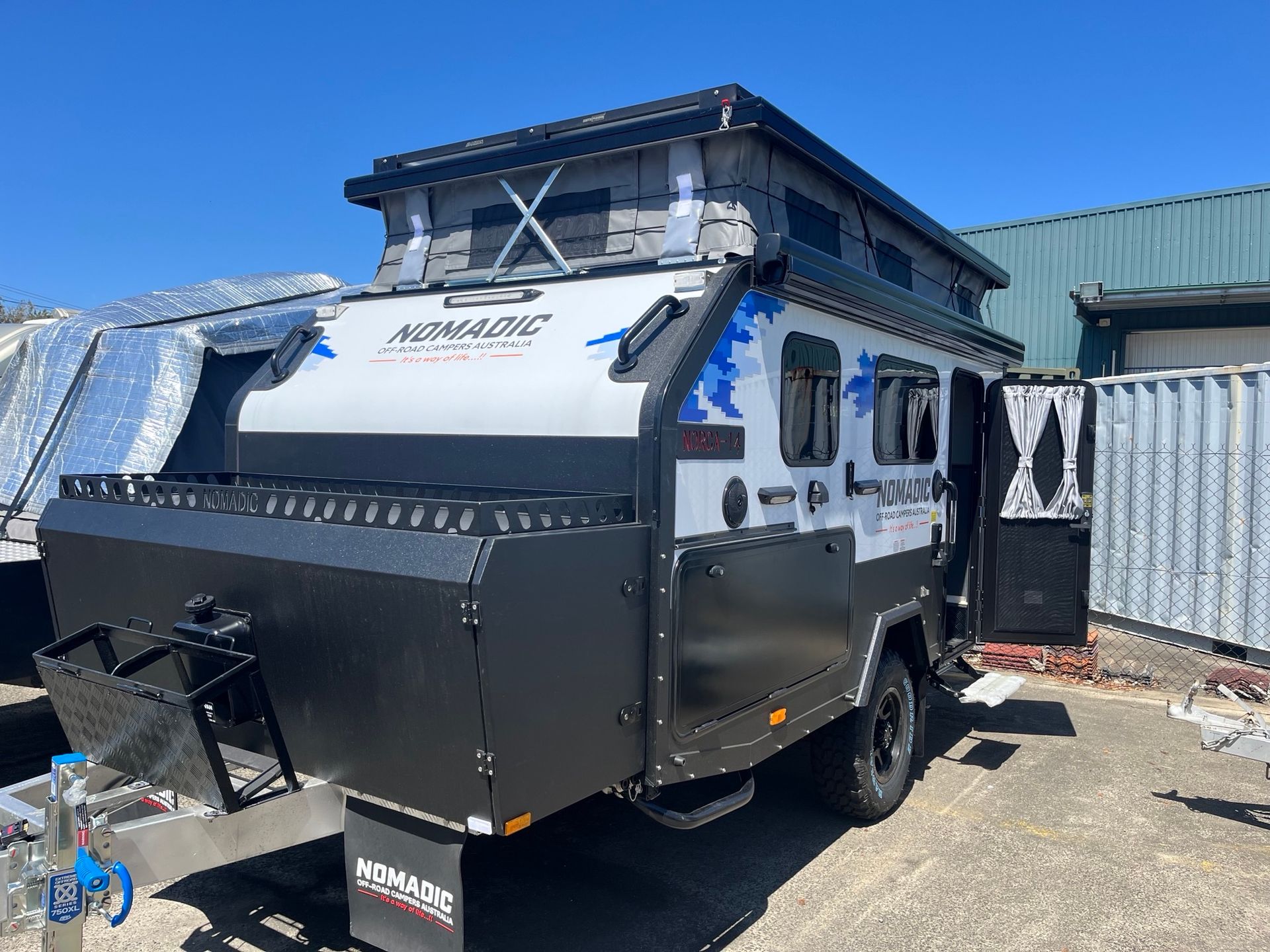 A New Hybrid Pop Top On Display In A Sales Yard - Perkins Caravans Ballina