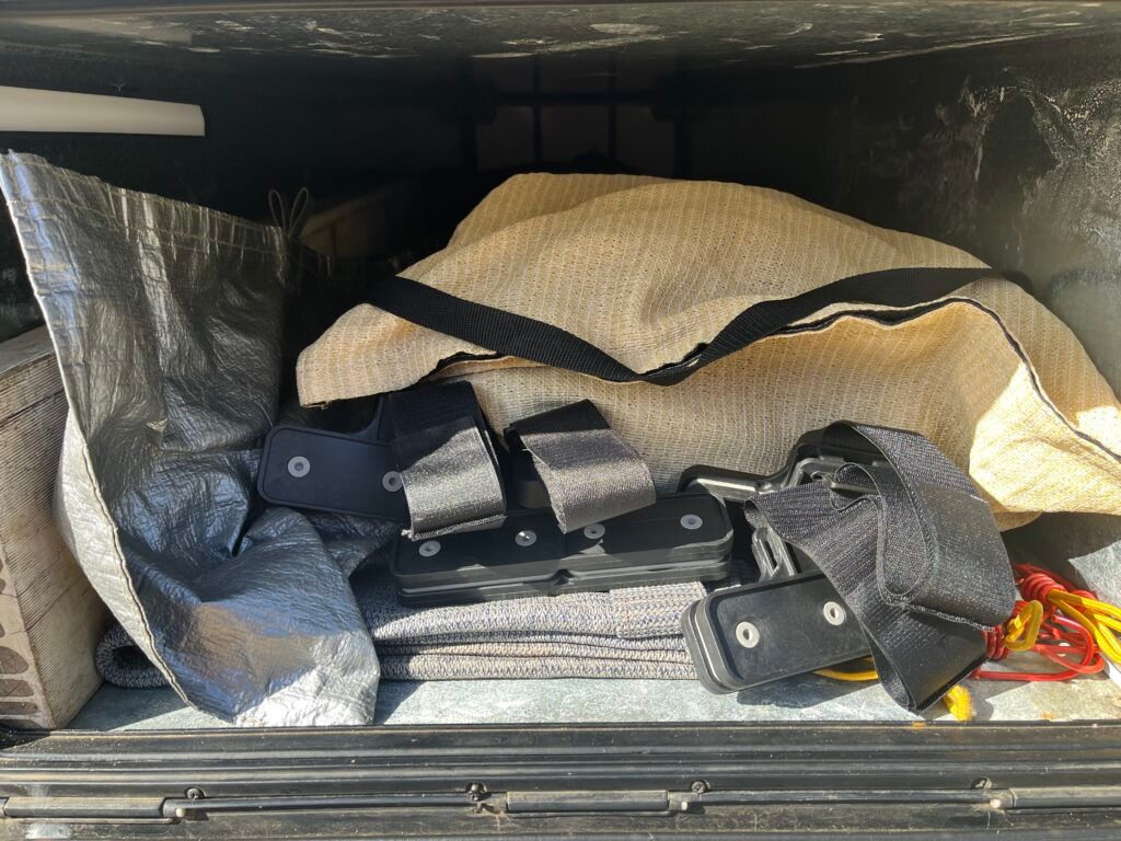 The Trunk Of A Truck Is Filled With A Lot Of Items — Perkins Caravans in Ballina, NSW
