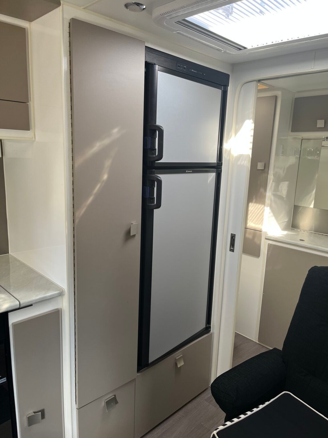 There Is A Refrigerator In The Corner Of The Room — Perkins Caravans in Ballina, NSW