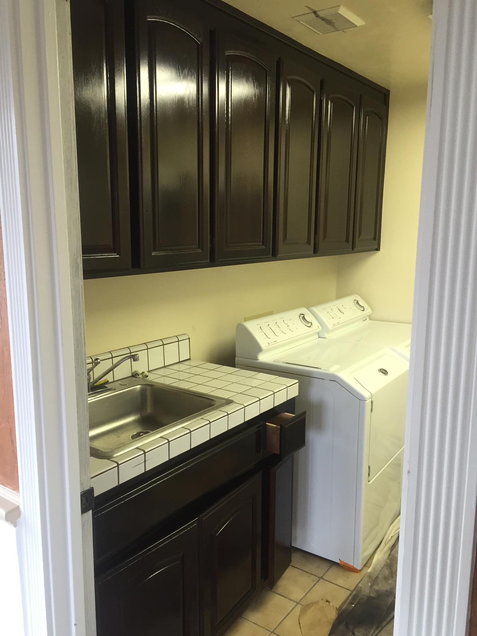 After Laundry Cabinets Paint — Spokane, WA — TM Painting & Construction