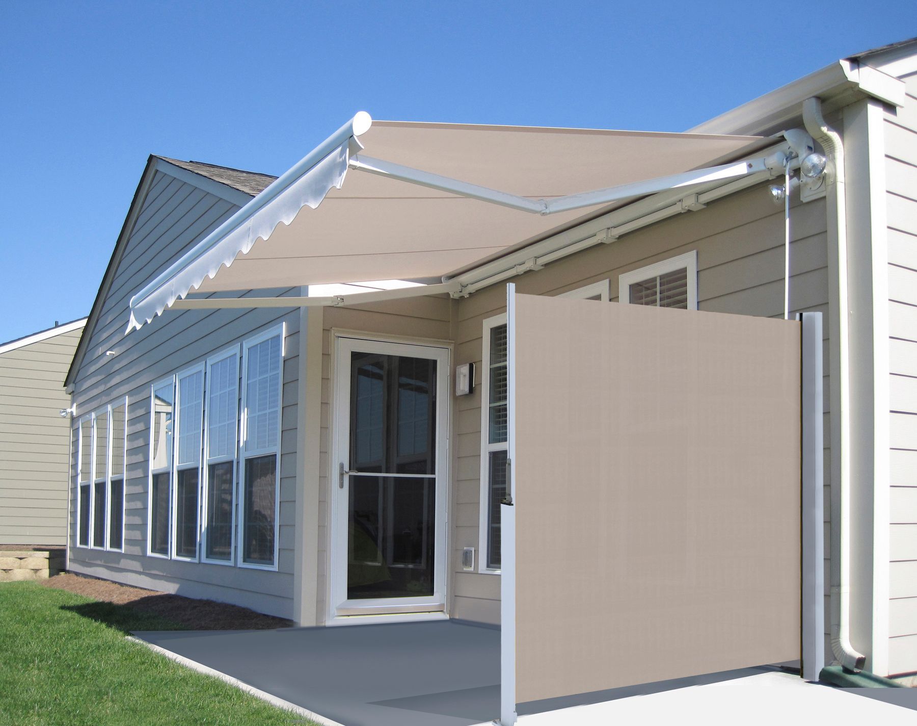 A house with an awning on the side of it