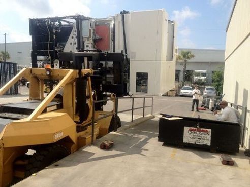 Men Moving Equipment - Rigging Contractors in Tampa, FL