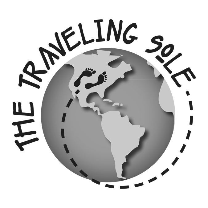 Black and white version of The Traveling Sole logo, representing barefoot massage and bodywork services in Omak, WA