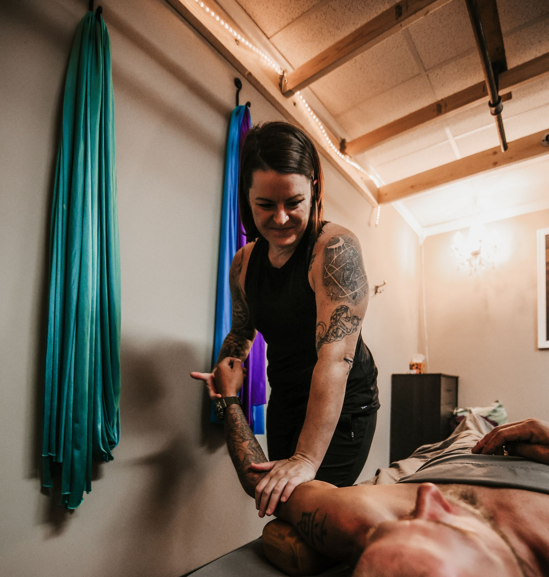 Professional bodywork session emphasizing the power of therapeutic touch to help the body reset and