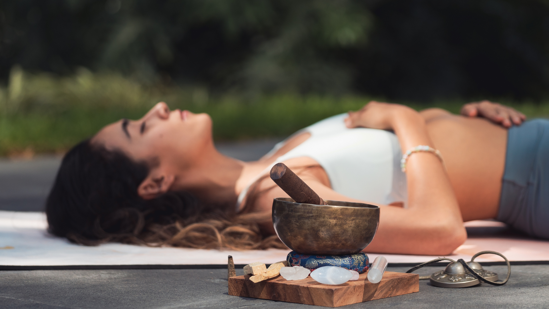 Person practicing diaphragmatic breathing with one hand on chest and one on belly.