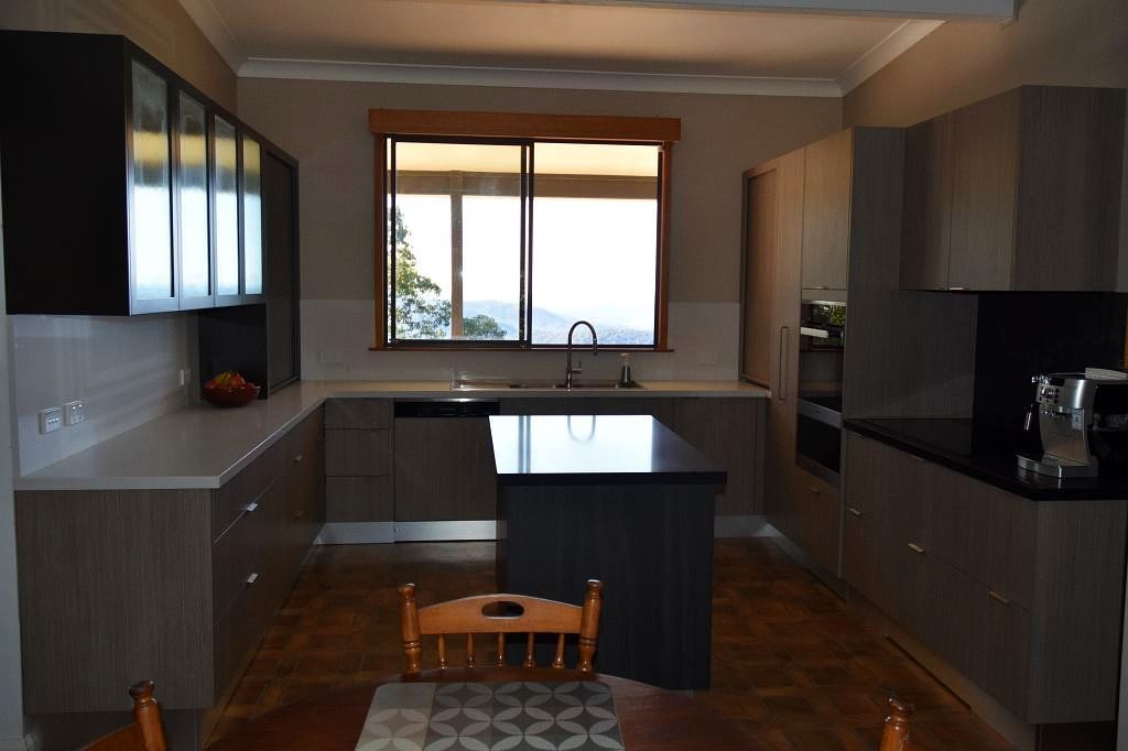 A Kitchen With a Table and Chairs and a Window — Stephen Veigel Kitchens In Terrigal, NSW