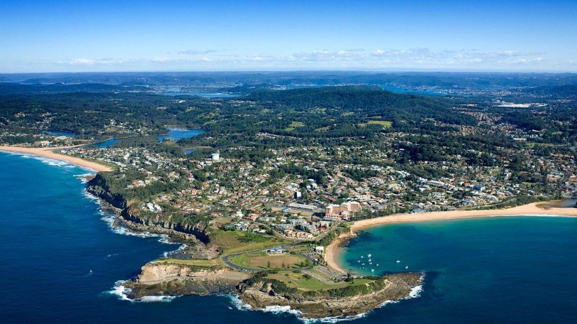 An Aerial View of a Small Island in the Middle of the Ocean — Stephen Veigel Kitchens In Gosford, NSW