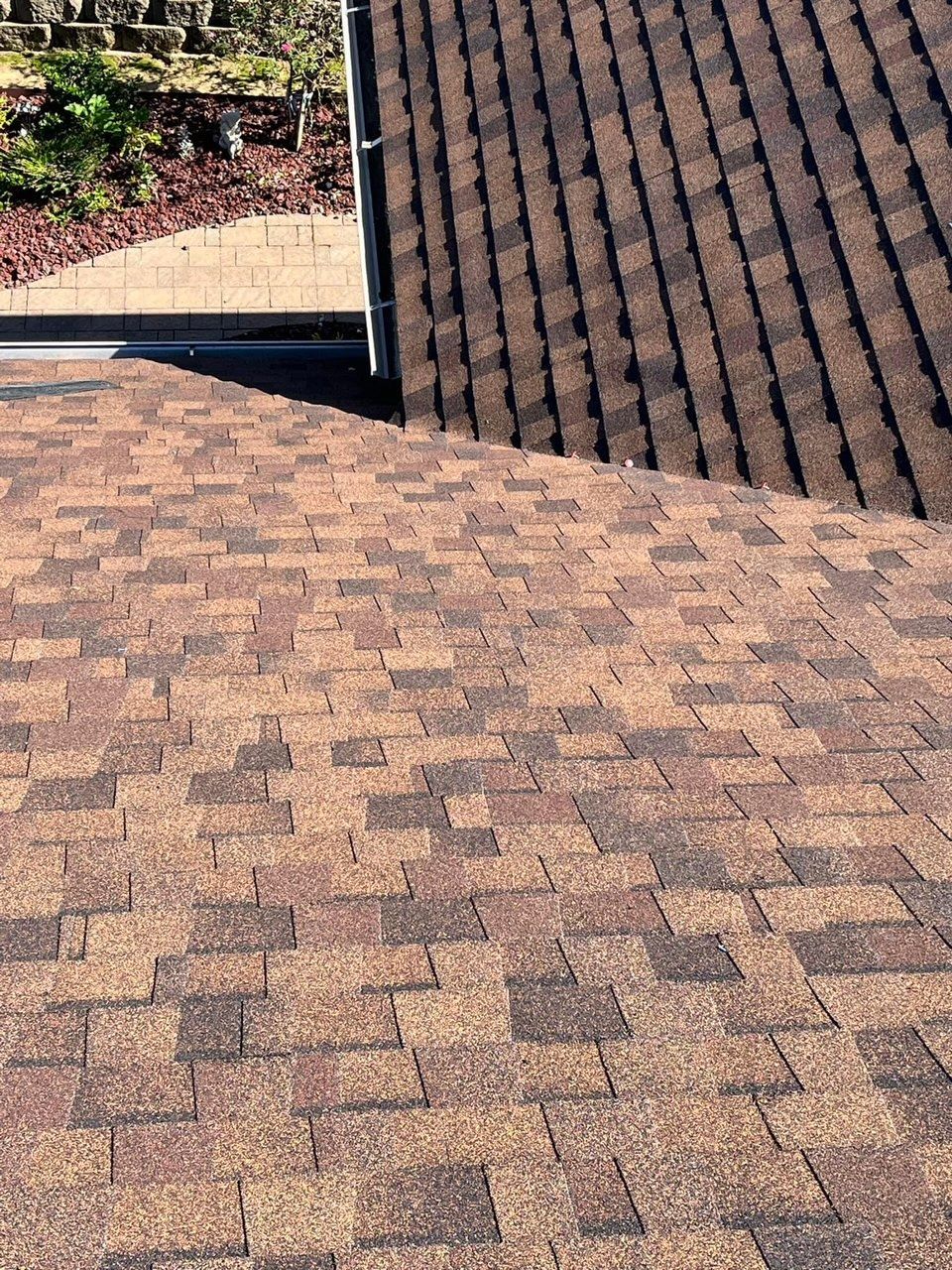 A close up of a roof with shingles on it.