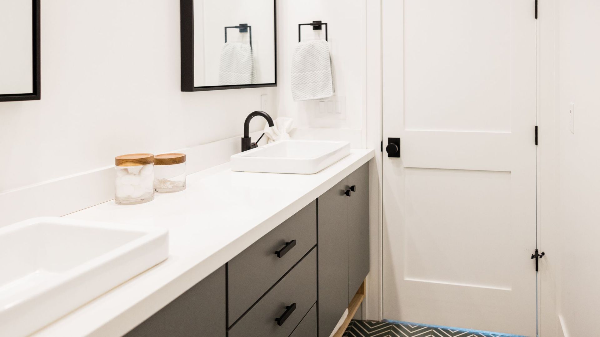 White bathroom with black accents 