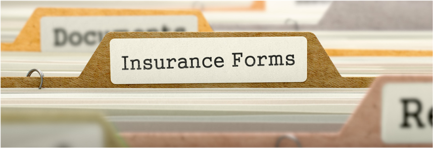 File folders labeled “Insurance Forms” in a document organizer.