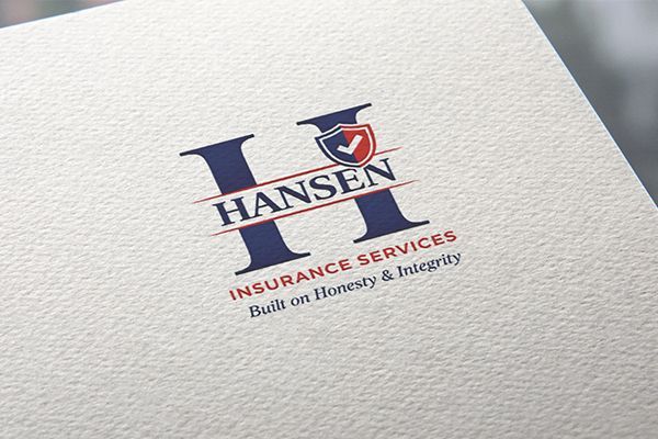 Hansen Insurance Services logo in navy and red on textured white paper, with “Built on Efficiency & Integrity” text