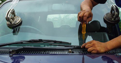 Mobile Auto Glass — Glazier Using Tools Repairing To Fix Crack Broken Windshield in San Jose, CA