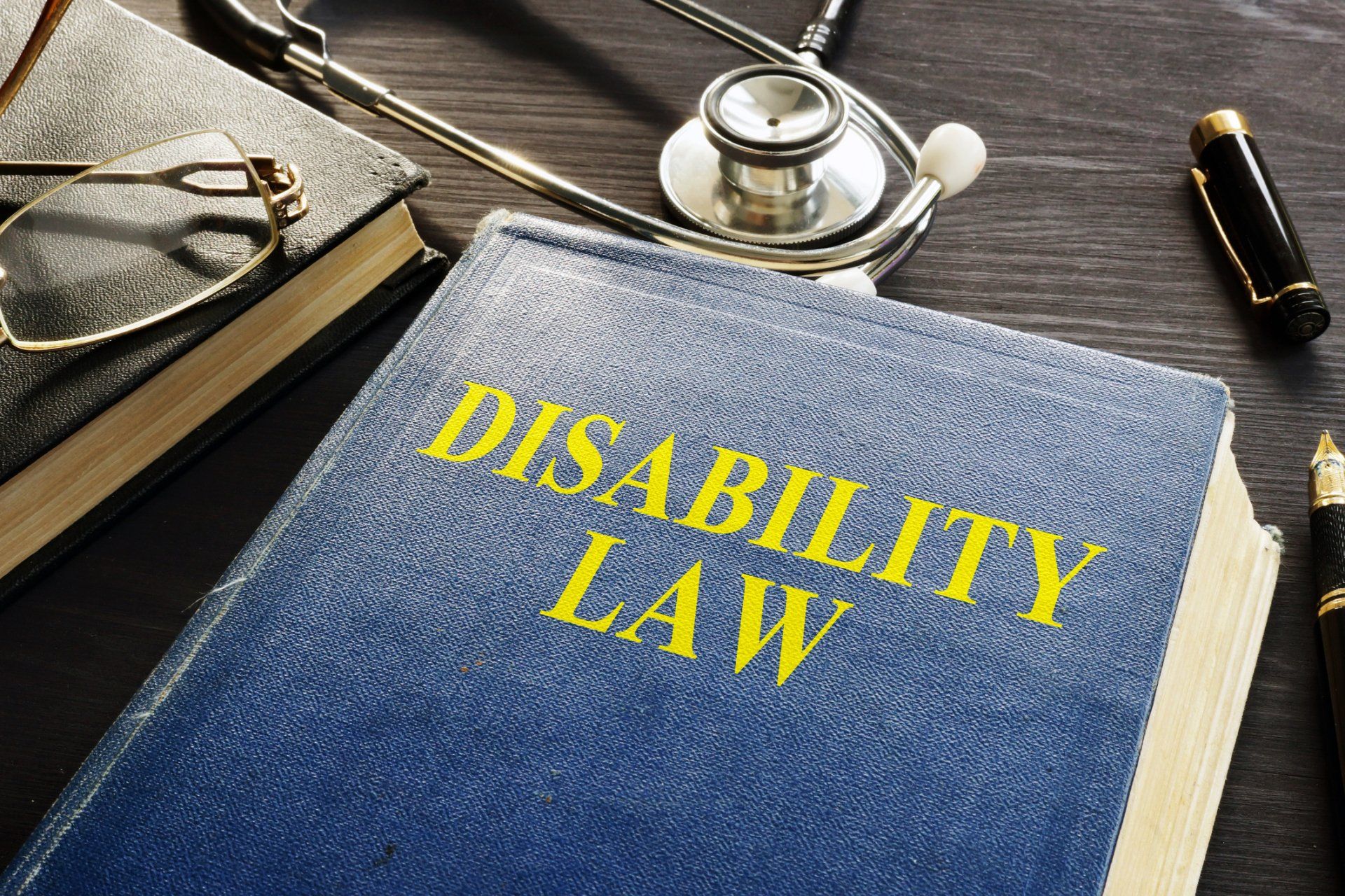 Disability Law Book And Stethoscope — San Diego CA — Iler & Iler
