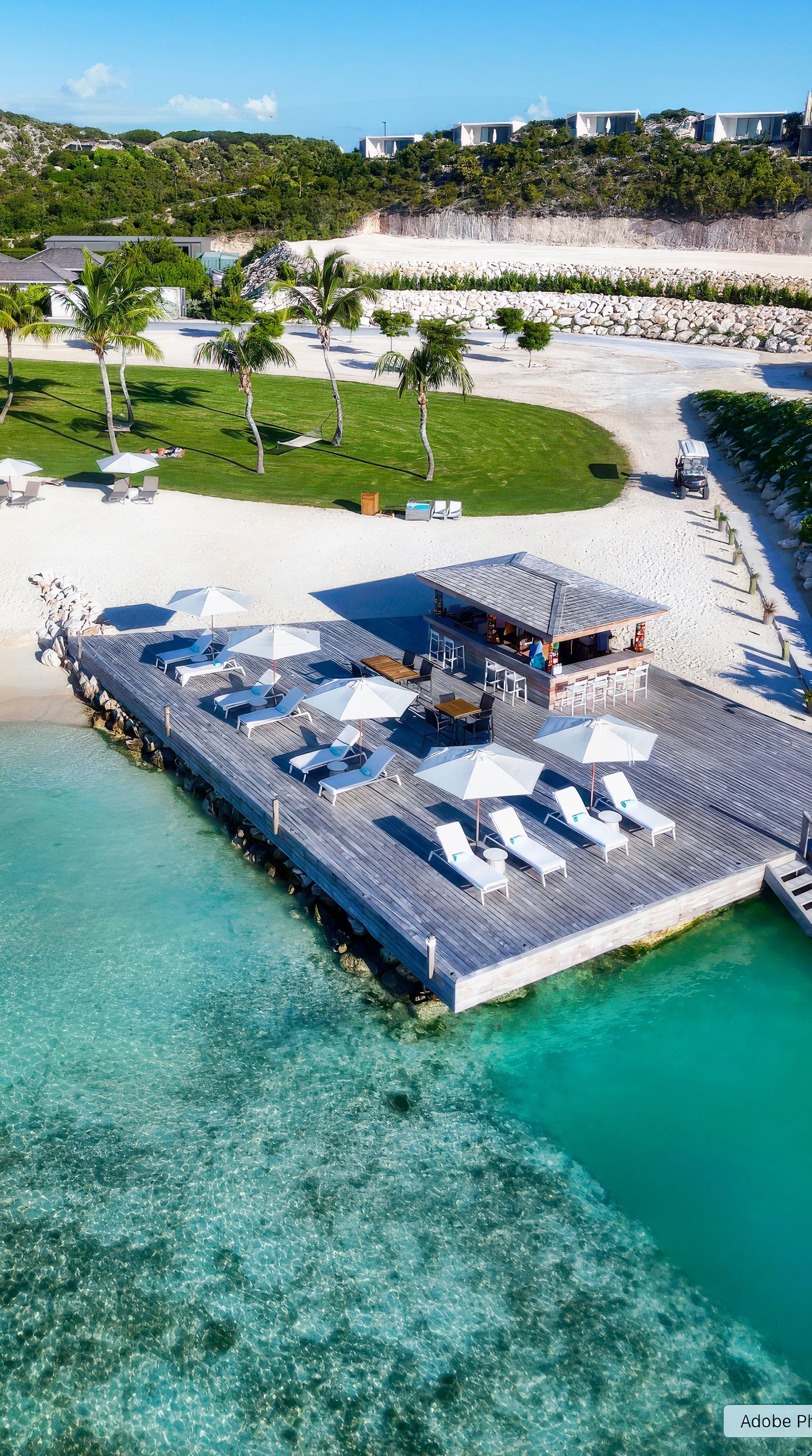 A man and a woman are sitting on a boat in the ocean