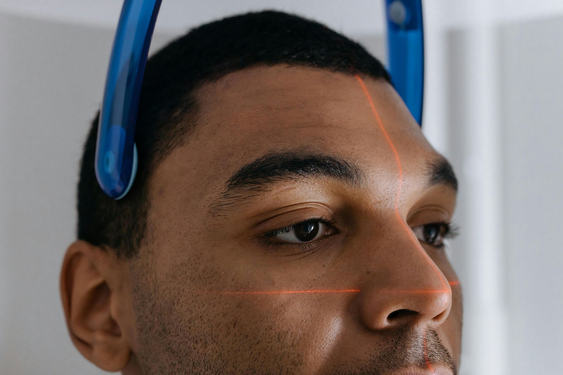 A man is getting an x-ray of his head.