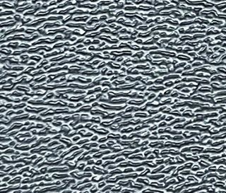 Textured metallic surface with a repeating pattern of organic shapes.