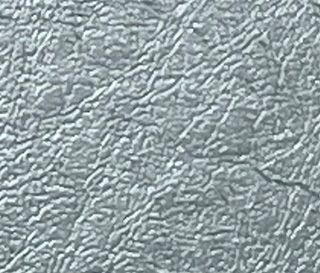 Close-up of textured silver leather surface.