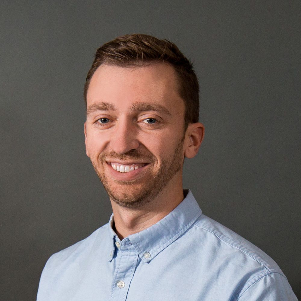 Solid blue background.