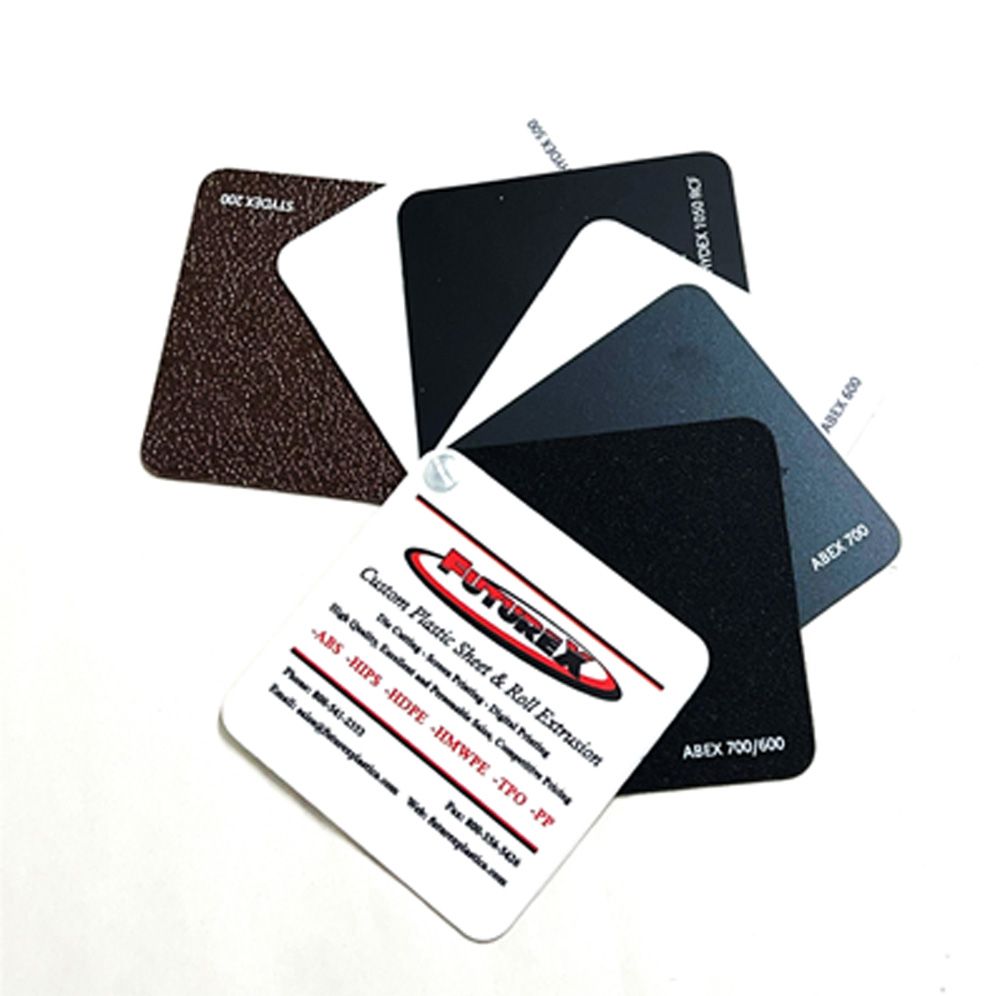 Color samples for plastic sheets and roll extrusion in various shades, with a company logo in the center.