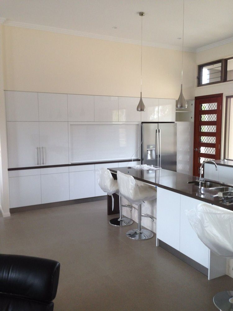 Kitchen Area With White Cabinets — Painting In Pacific Heights, QLD