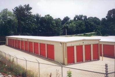 Red Garage Doors of a Ware House - Rutherfordton, NC - Essential Garage Doors