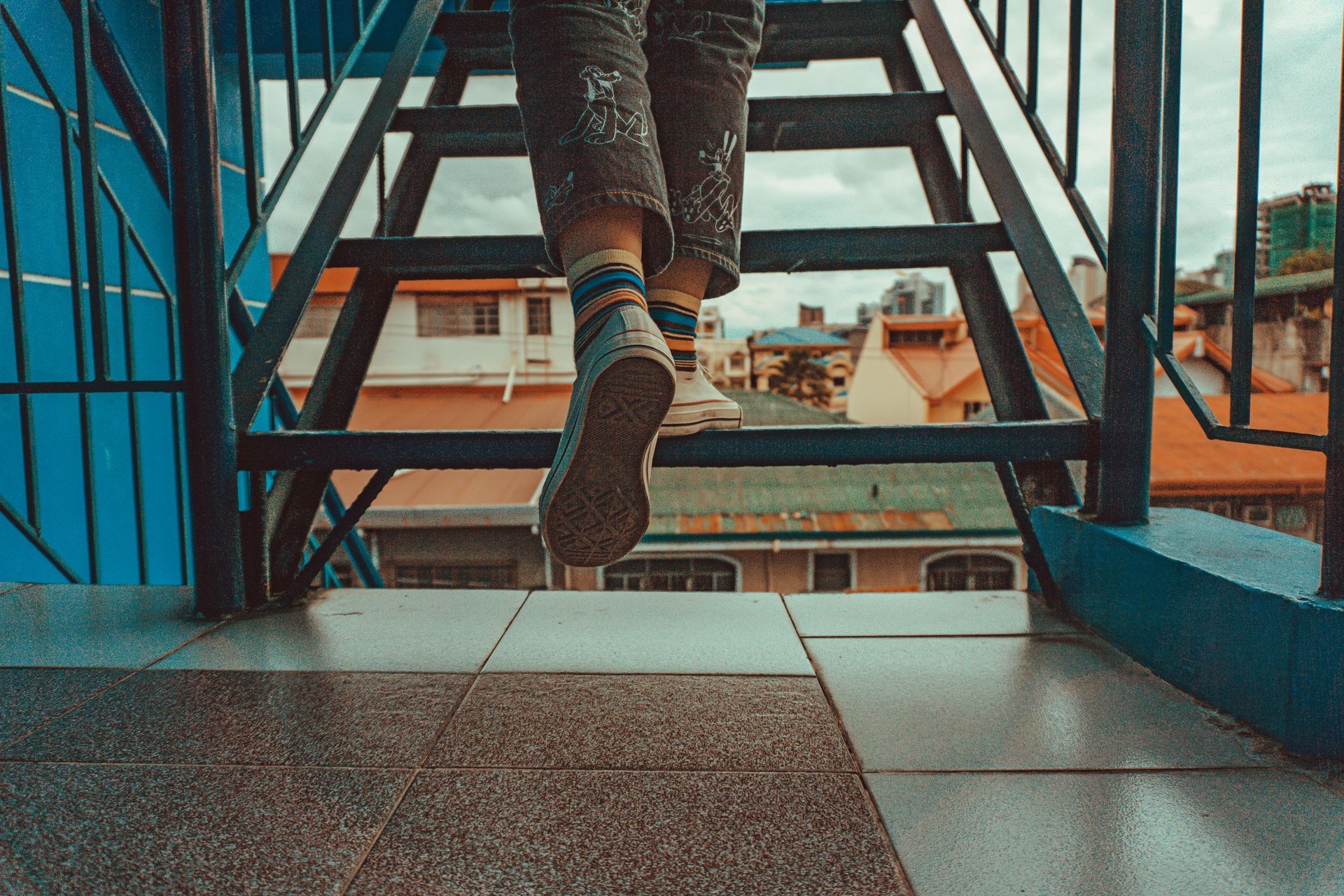 A person is walking up a set of stairs.