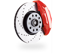 Red brake caliper on a drilled, silver brake rotor. | Auto Check Elite