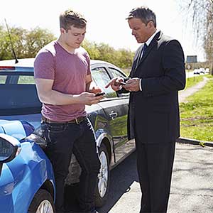 Two Drivers Exchange Insurance Details—auto insurance in County, MN