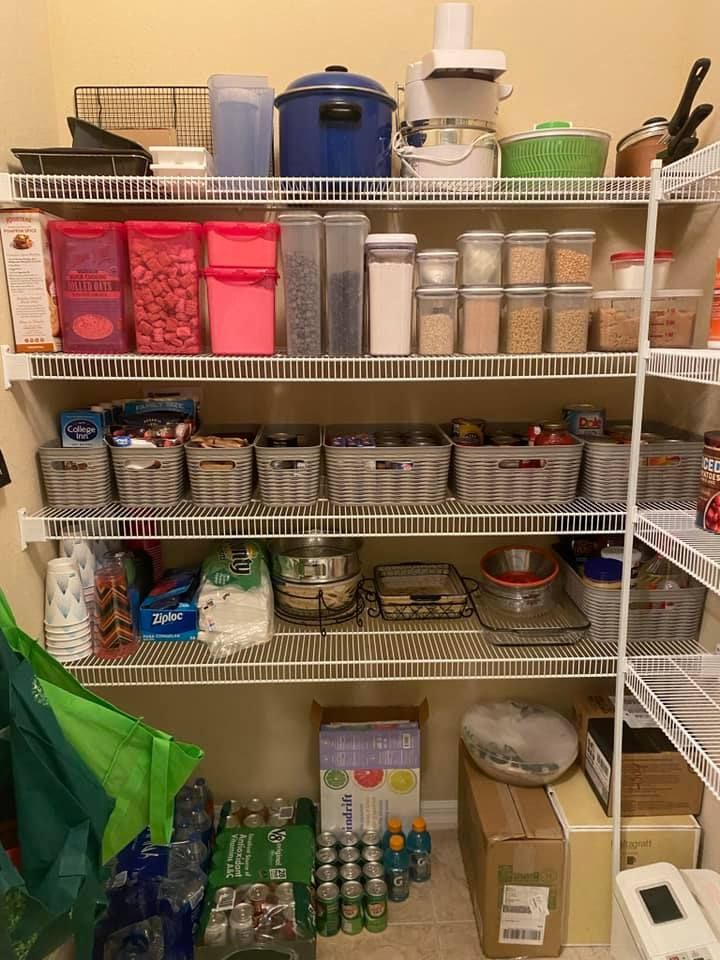 A pantry filled with lots of food and supplies.