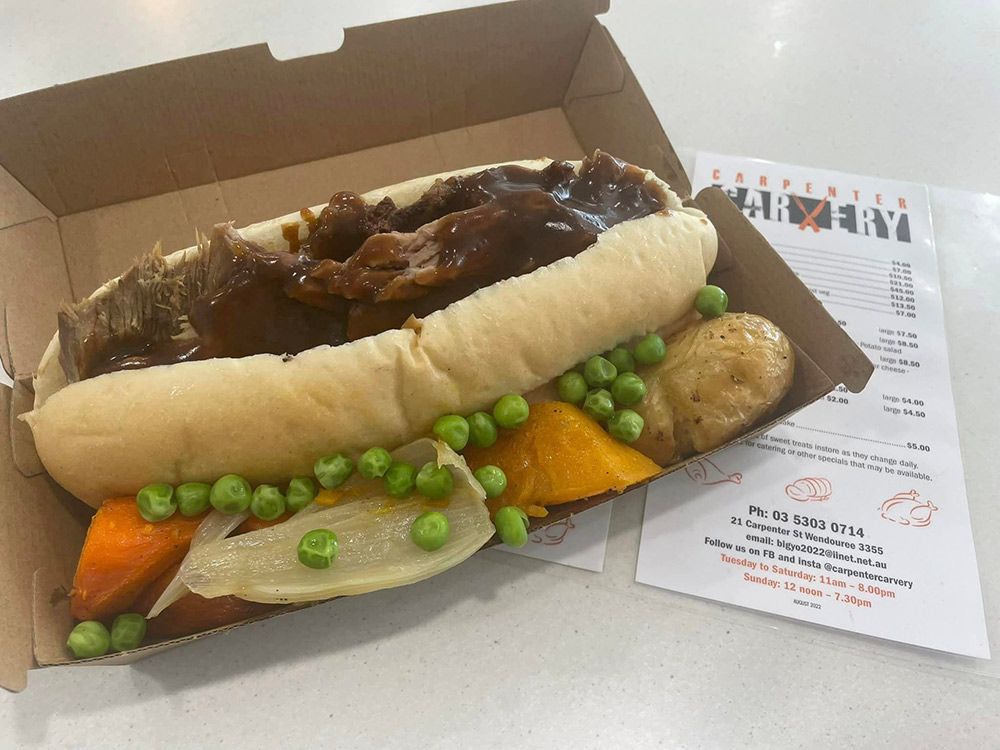 A Sandwich With Meat, Peas, Carrots and Potatoes in a Cardboard Box — Carpenter Carvery in Wendouree, VIC
